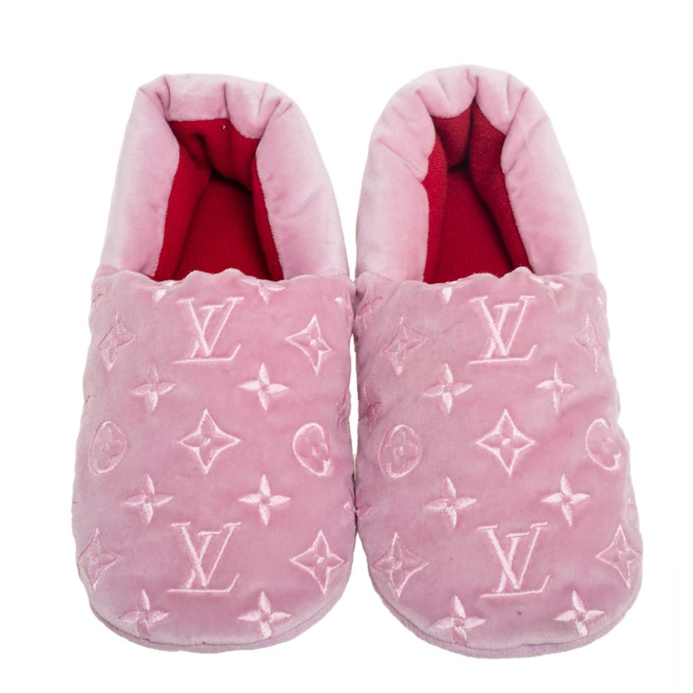 These slippers from Louis Vuitton are the epitome of comfort and luxury. Crafted from velvet, their front has been styled with LV monogram details and the pair features a fabric sole. Parade stylishly around your home in this dreamy pink