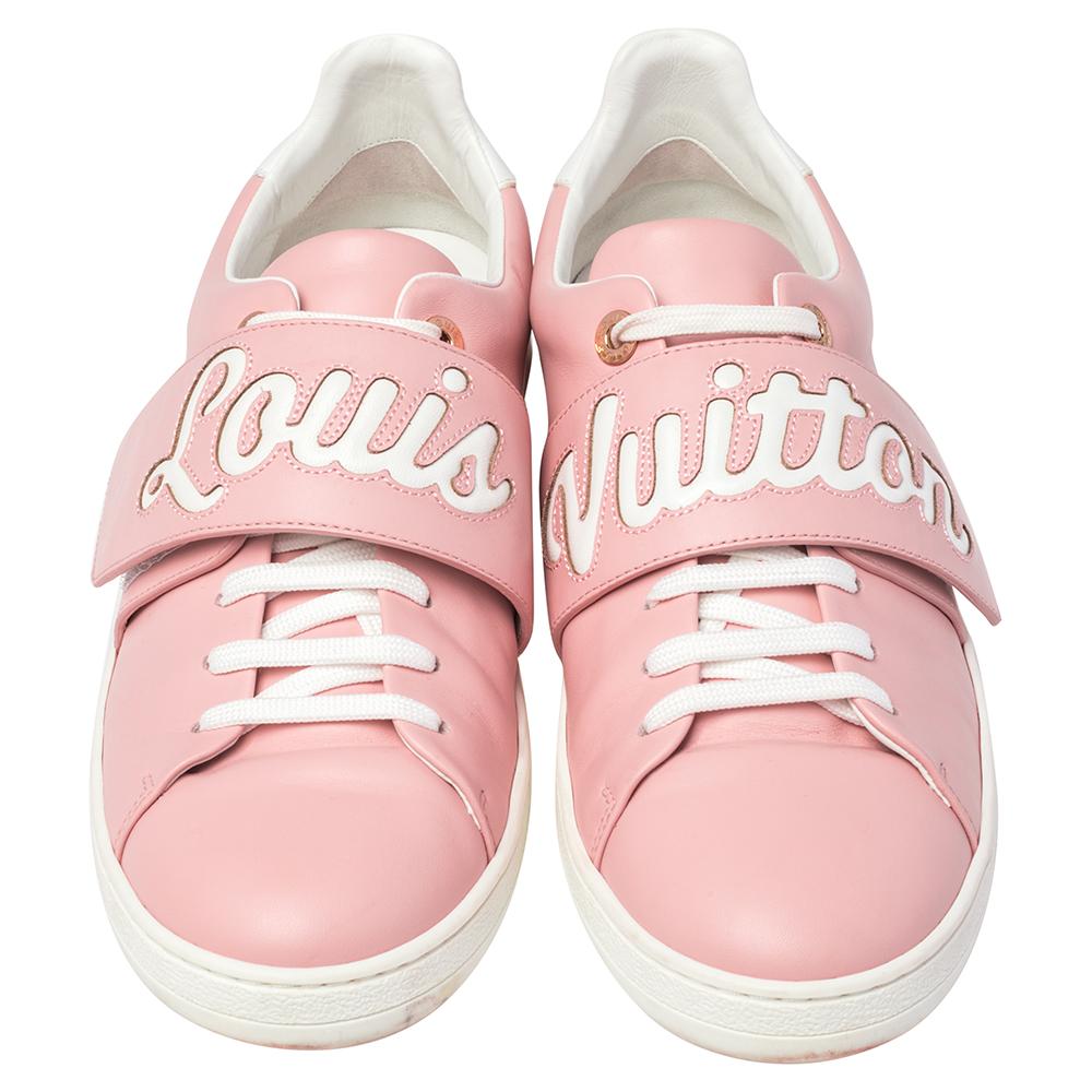 A great pair of sneakers like these Louis Vuitton ones have been missing from your wardrobe for a long time now! They come crafted from pink and white leather, styled with round toes, logo detailed velcro straps and lace-ups on the vamps, and