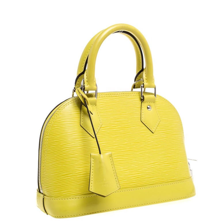 Alma bb leather handbag Louis Vuitton Yellow in Leather - 31514813