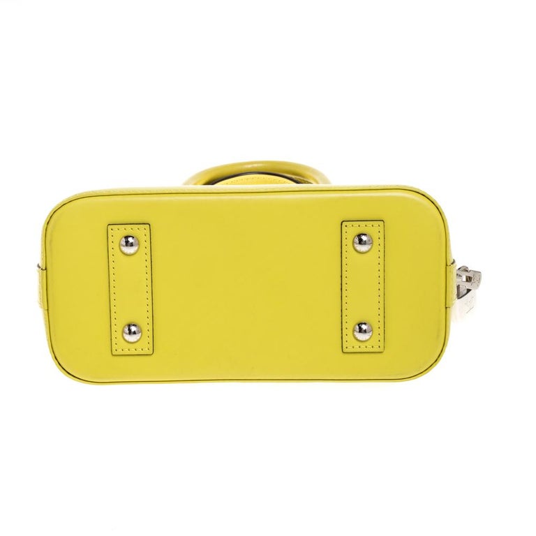Alma bb leather handbag Louis Vuitton Yellow in Leather - 31514813