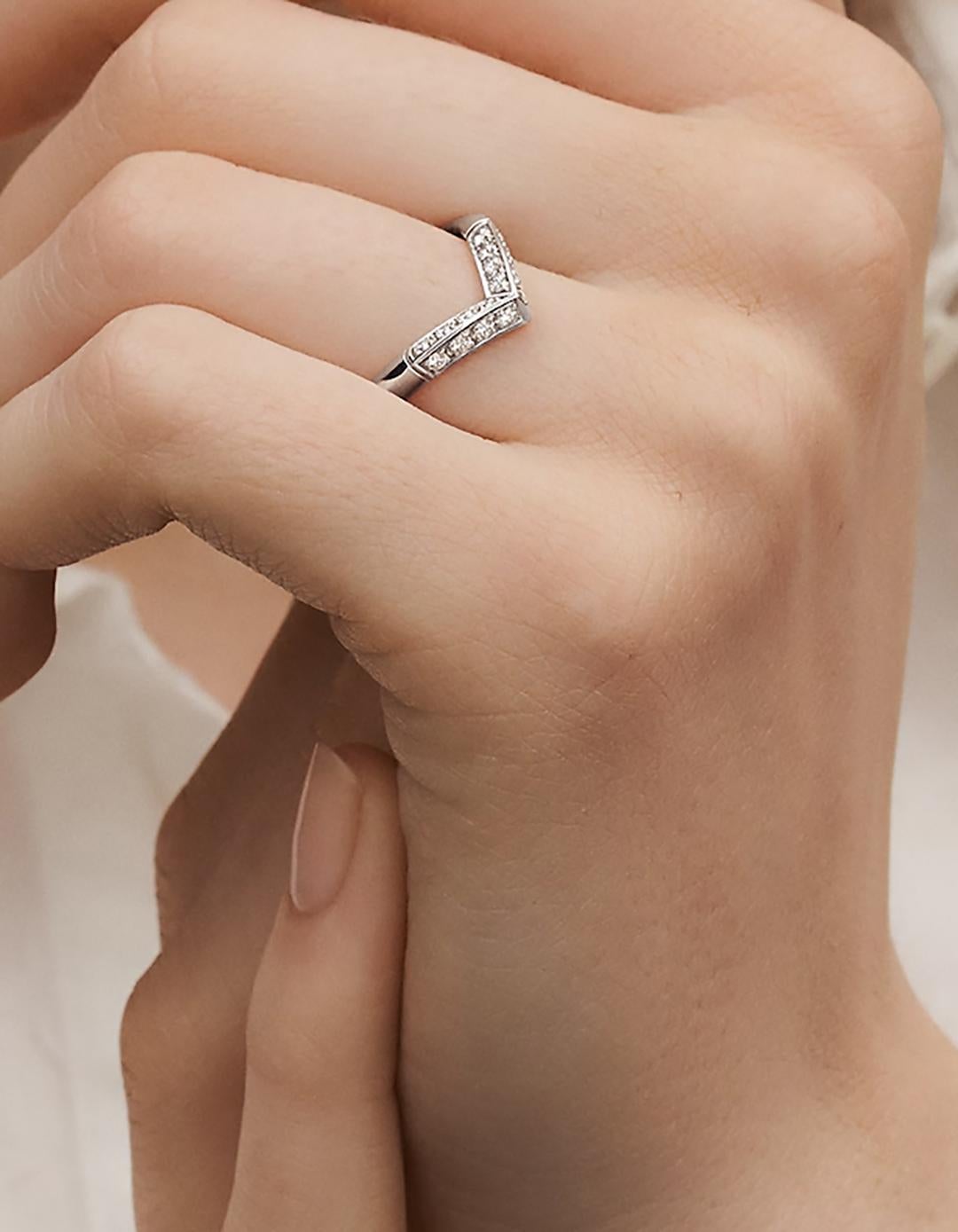 Louis Vuitton Platinum LV Diamonds Pavé V Ring

Materials: Platinum 950, 16 diamonds, ~ 0.30 ct
Overall Condition: Excellent
Includes: LV pouch
Retail: $4,650 plus tax 

Size: 53/ US 6.5
Tip width: ~ 3.9 mm Back width: ~ 2.7 mm