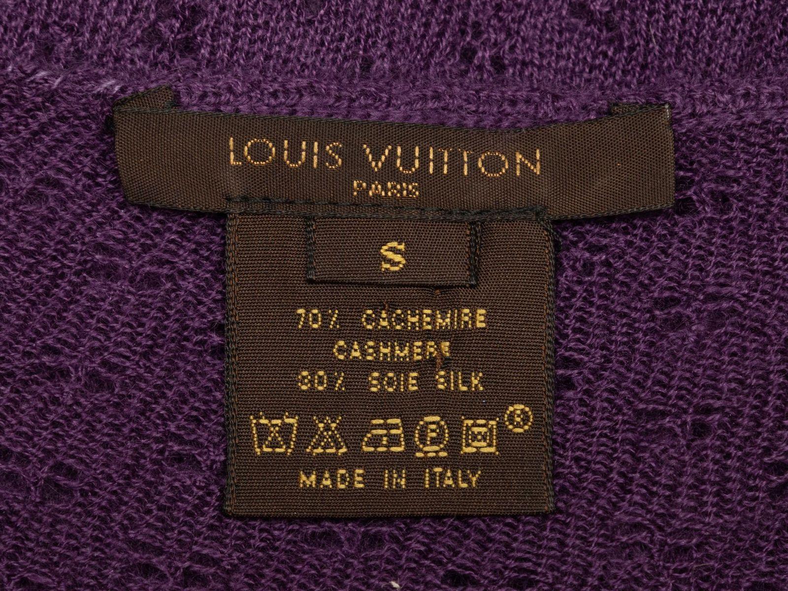 Product Details: Plum cashmere and silk-blend open knit cardigan by Louis Vuitton. Scoop neckline. Button closures at center front. 30