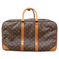 Louis Vuitton Poche Sac Trois 223277 Brown Coated Canvas Weekend/Travel Bag