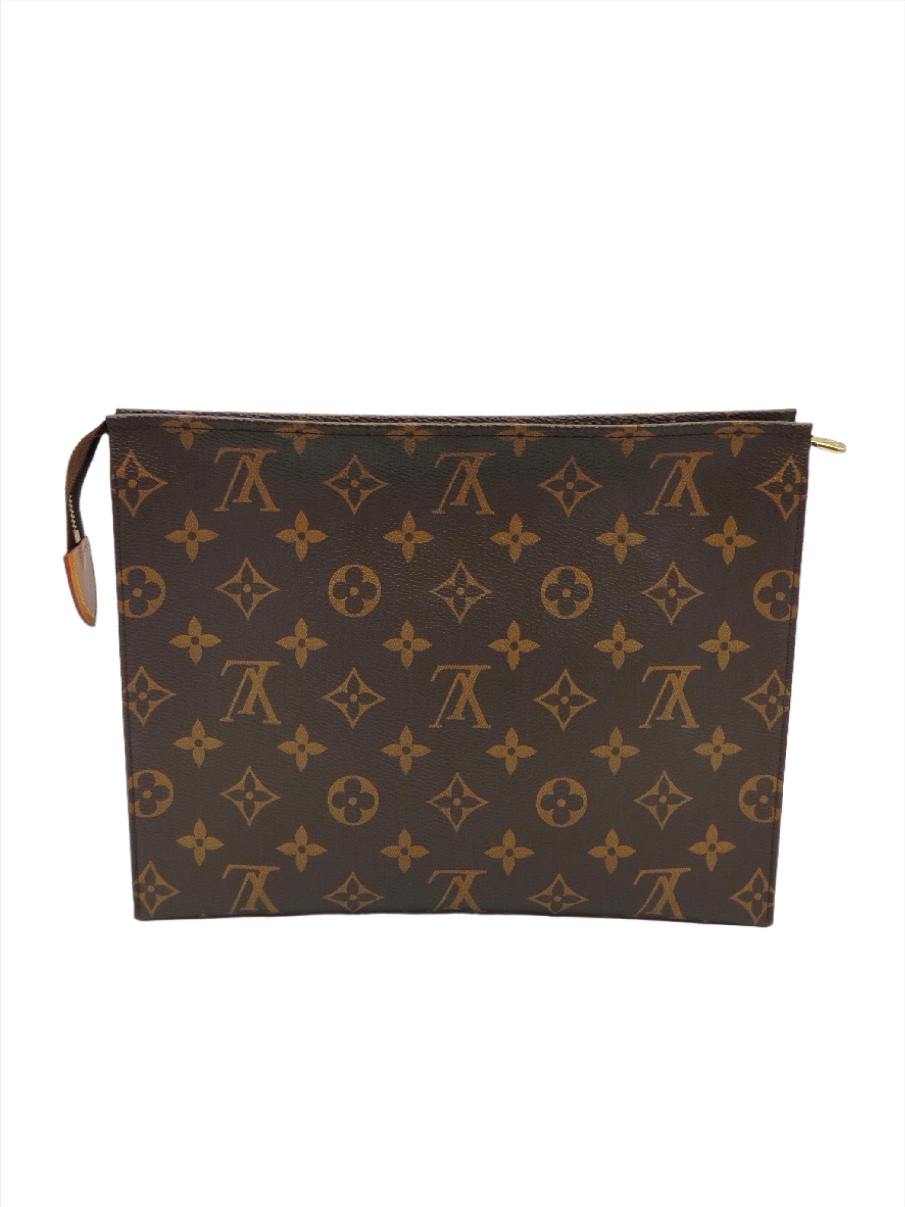 The Poche Toilette offers a convenient, stylish way to carry personal necessities. Crafted in Louis Vuitton’s timeless Monogram canvas and fine black cowhide with a gold-finish zipper, it emanates quality and sophistication. More than just a