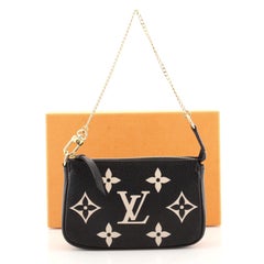 Louis Vuitton Pochette Accessoires Bicolor Monogram Empreinte Giant Mini