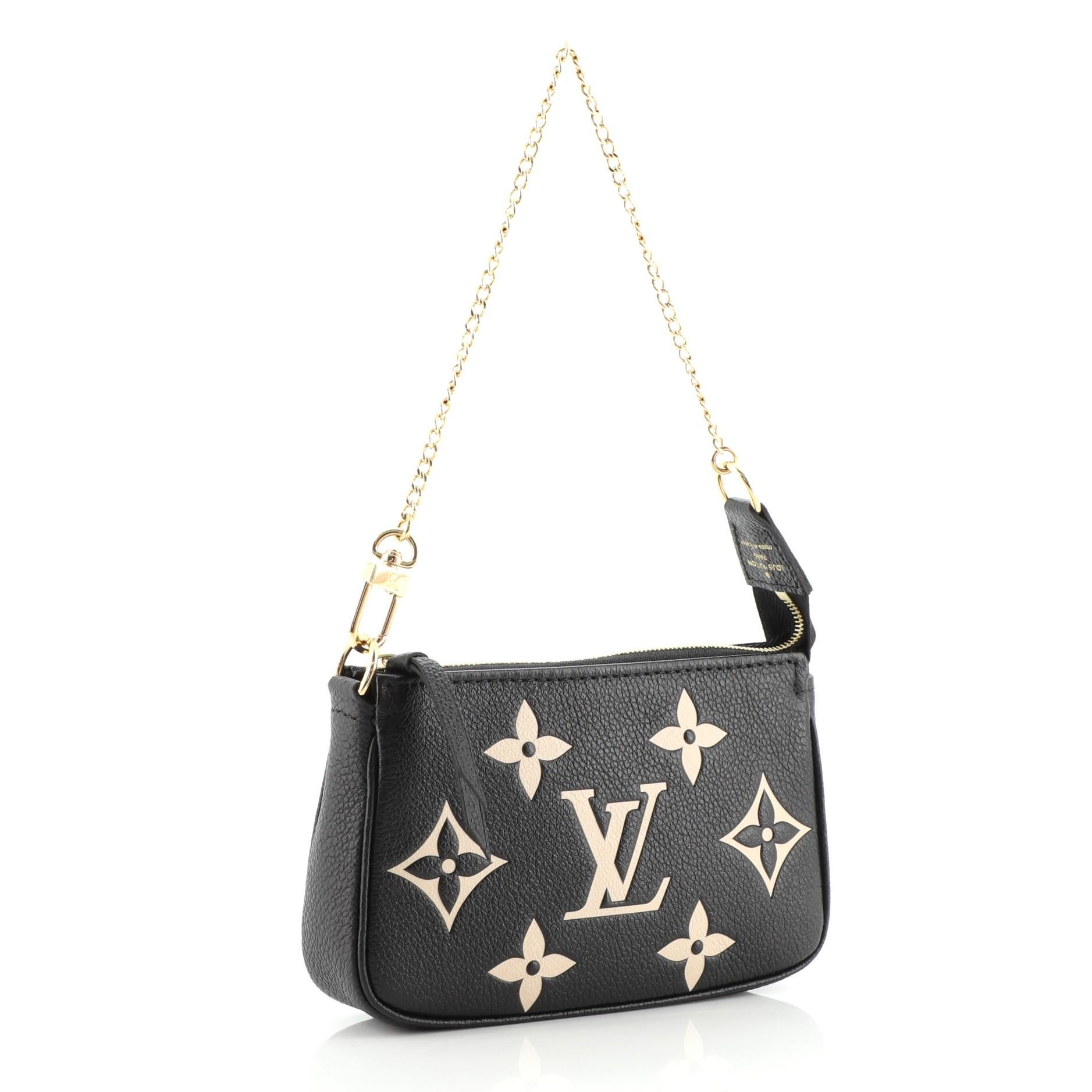 Louis Vuitton Pochette Accessoires Bicolor Monogram Empreinte Giant Mini In Good Condition In NY, NY