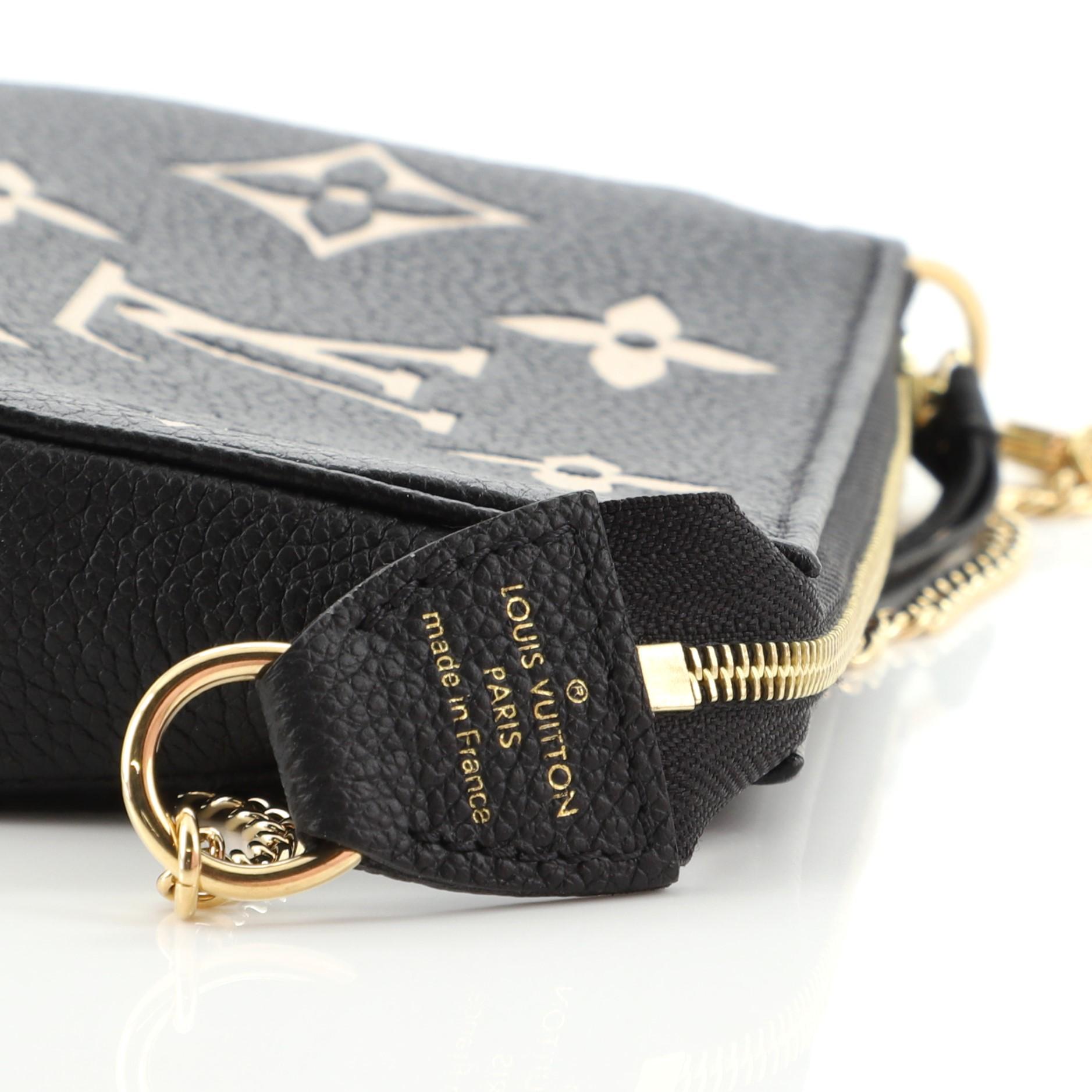 Louis Vuitton Pochette Accessoires Bicolor Monogram Empreinte Giant Mini In Good Condition In NY, NY