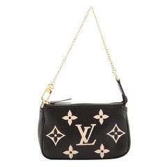 Louis Vuitton Pochette Accessoires Bicolor Monogram Empreinte Giant Mini