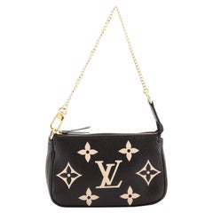 Louis Vuitton Pochette Accessoires Bicolor Monogram Empreinte Giant Mini