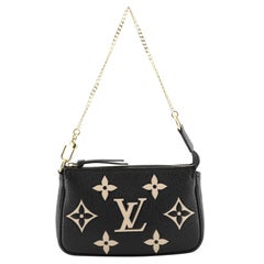 Louis Vuitton Pochette Accessoires Bicolor Monogram Empreinte Giant Mini