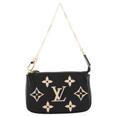 Louis Vuitton Pochette Accessoires Bicolor Monogram Empreinte Giant Mini