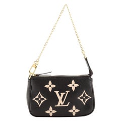 Louis Vuitton Pochette Accessoires Bicolor Monogram Empreinte Giant Mini
