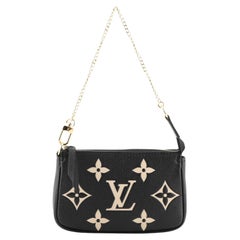 Louis Vuitton Brown Monogram Mini Lin Pochette Accessoires with Chain  111LV11 For Sale at 1stDibs