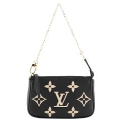 Louis Vuitton Pochette Accessoires Bicolor Monogram Empreinte Giant Mini