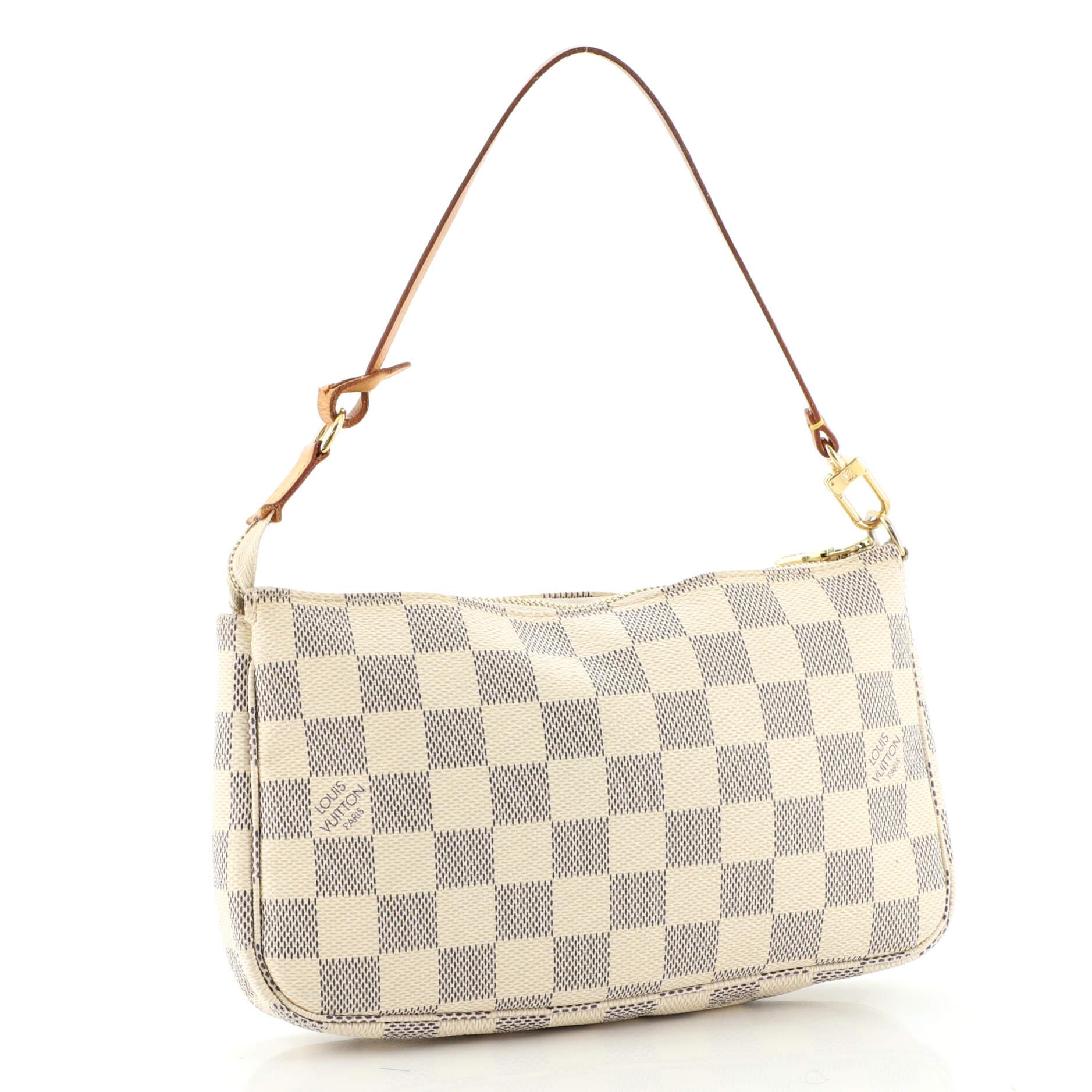 Condition: Good. Odor in interior. Creasing and discoloration on exterior, wear on opening and exterior edges. Darkening leather trim, zipper tape and handle, marks in interior, scratches and discoloration on hardware.
Accessories: With