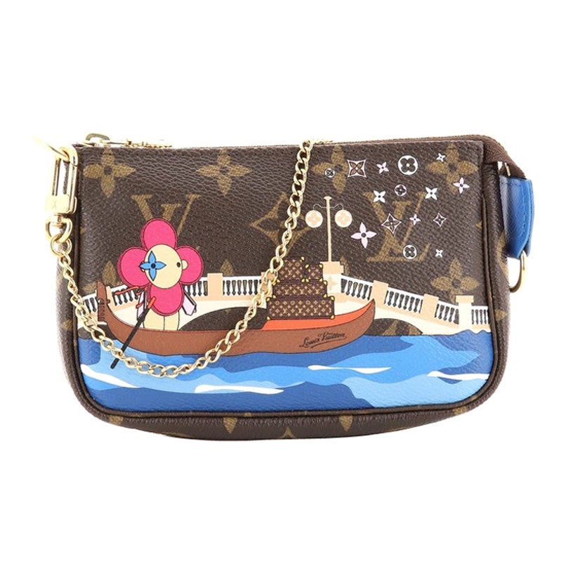 Louis Vuitton Pochette Accessoires Limited Edition Vivienne Xmas Monogram Canvas