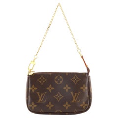 Louis Vuitton mini pochette accessoires. On website search for