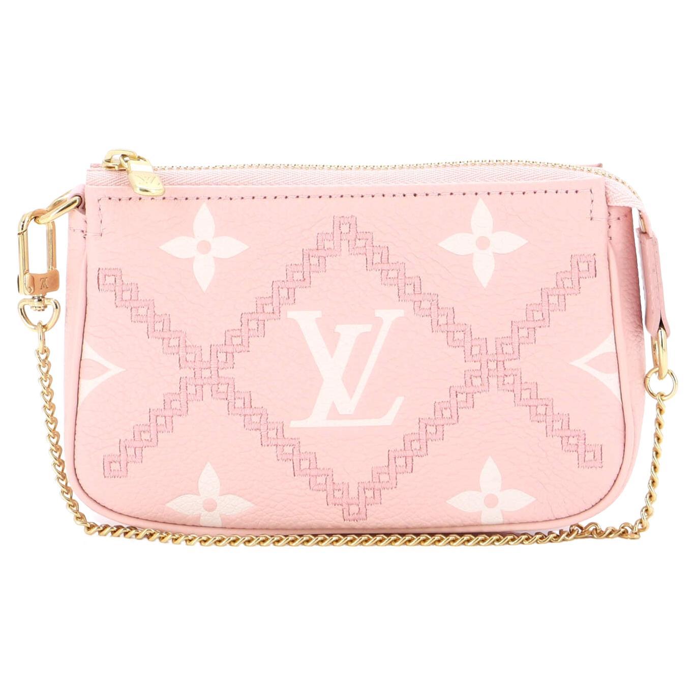 Louis Vuitton Mini Pochette Accessoires Monogram Vivienne Fuchsia Pink