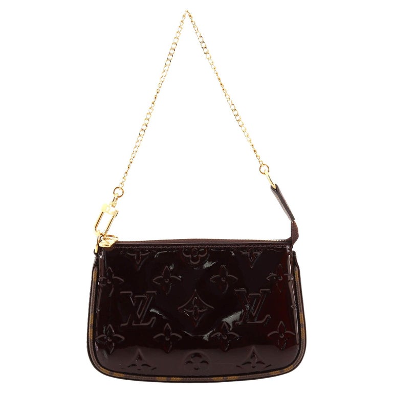 pochette accessoires monogram vernis leather