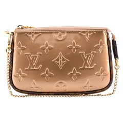 Louis Vuitton Félicie mini pochette bag in pink monogram patent leather -  DOWNTOWN UPTOWN Genève