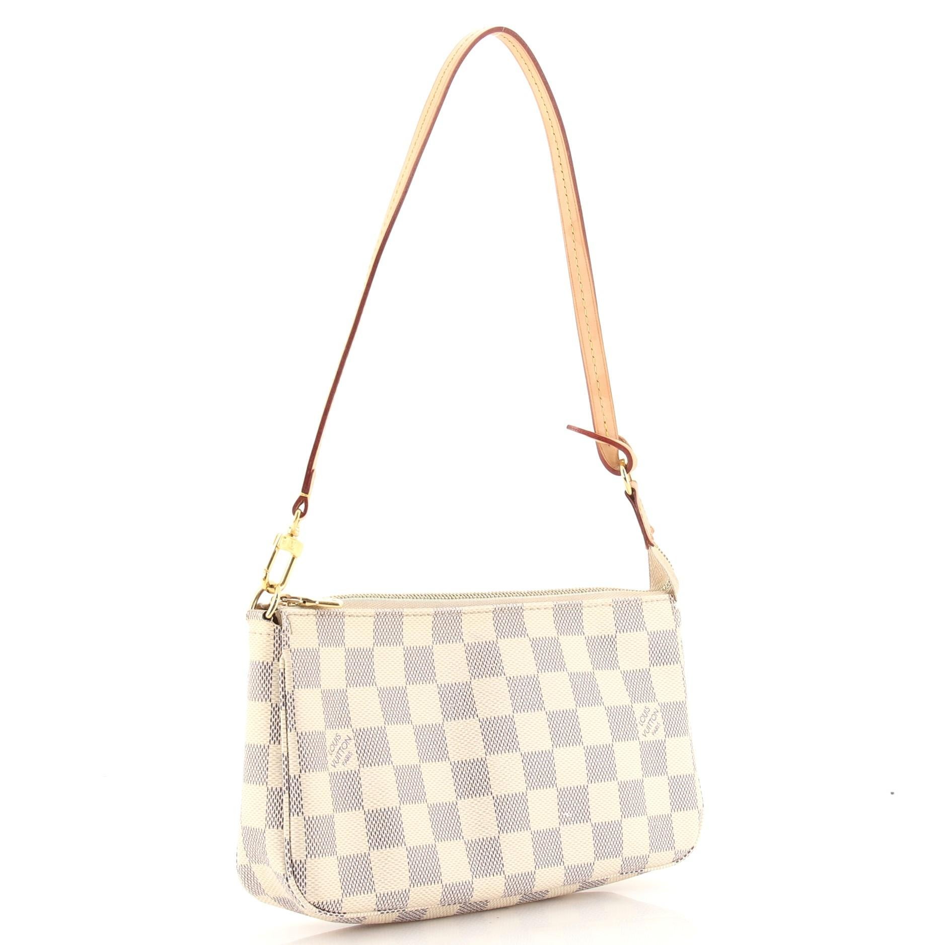 Condition: Good. Odor in interior. Creasing and wear on exterior, darkening, scuffs and watermarks on leather trims and strap, darkening and discoloration due to hardware on zipper tape. Moderate wear, marks and stains in interior, scratches,