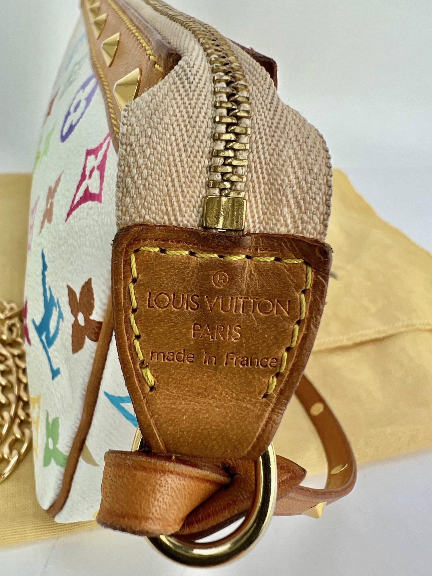 100% Authentic Pre-Owned
 Louis Vuitton Pochette Accessories White Multicolor Monogram
 Added Non LV Chain to use as a Crossbody
 RATING: B   very good, shows signs minor signs of wear
 MATERIAL: canvas, leather trim
 CHAIN: non LV golden chain 47''