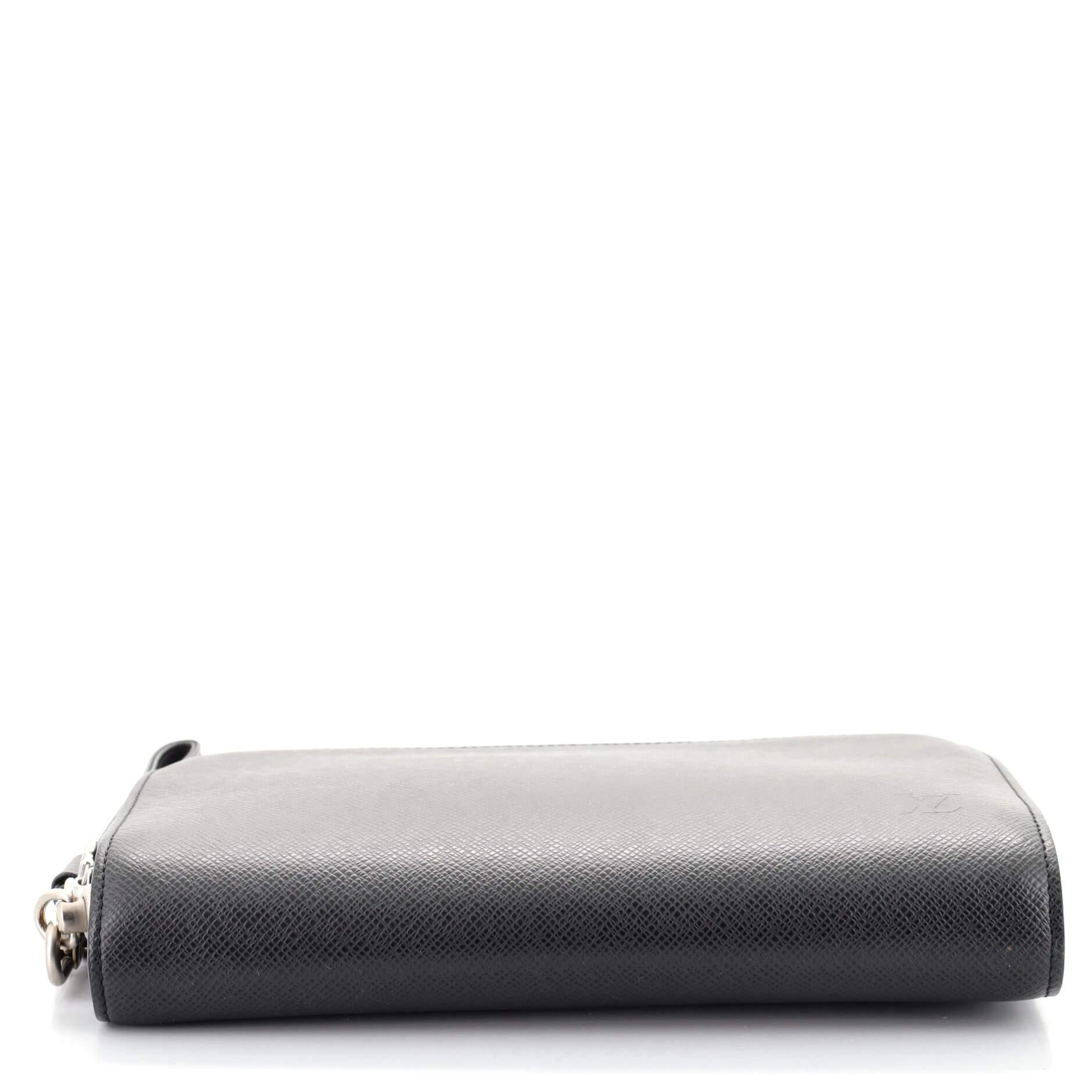 Louis Vuitton Pochette Baikal Clutch Taiga Leather In Good Condition In NY, NY