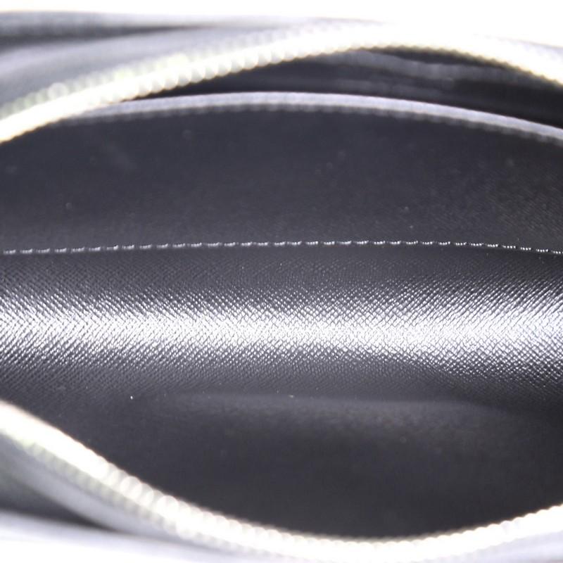 Women's or Men's Louis Vuitton Pochette Baikal Clutch Taiga Leather 