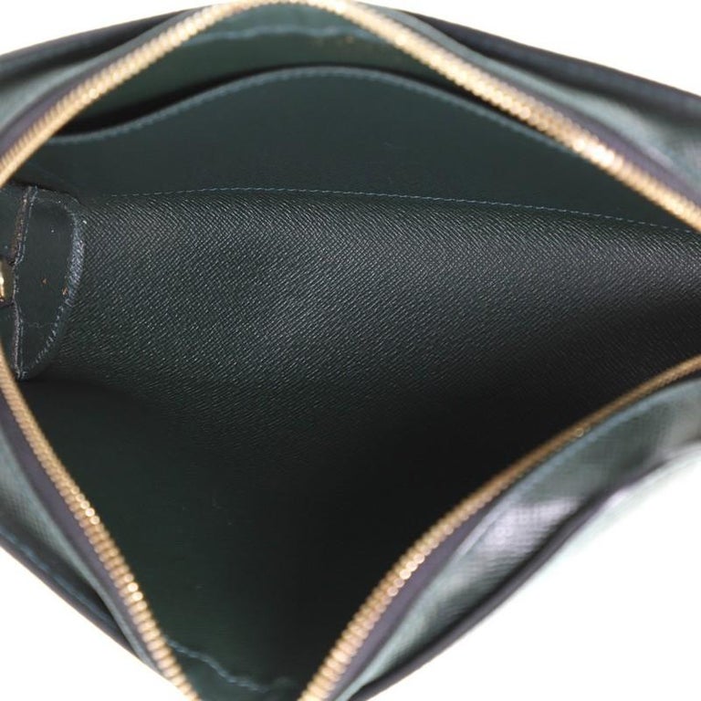 Louis Vuitton Pochette Baikal Clutch Taiga Leather at 1stdibs