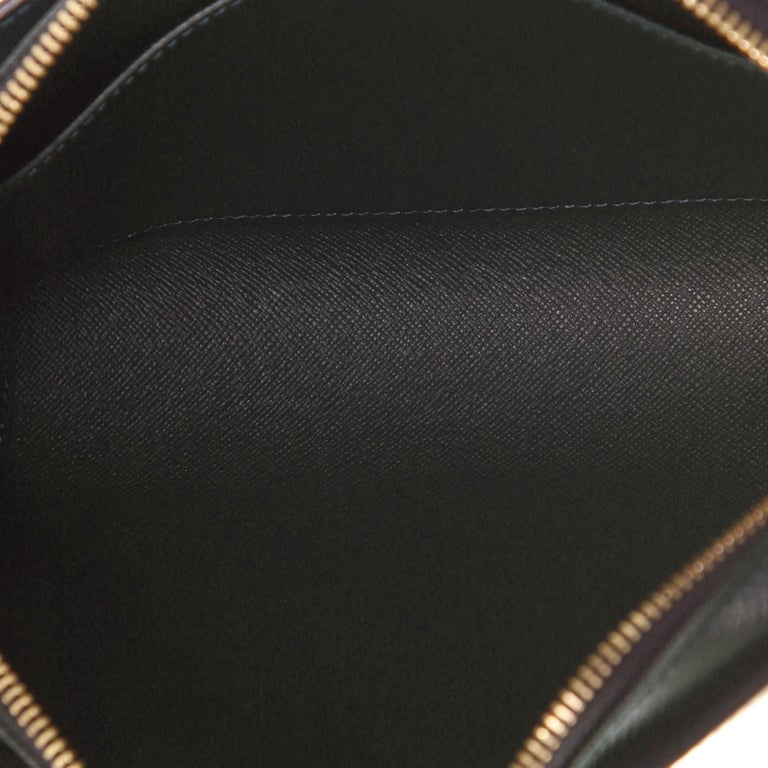 Louis Vuitton Pochette Baikal Clutch Taiga Leather at 1stDibs