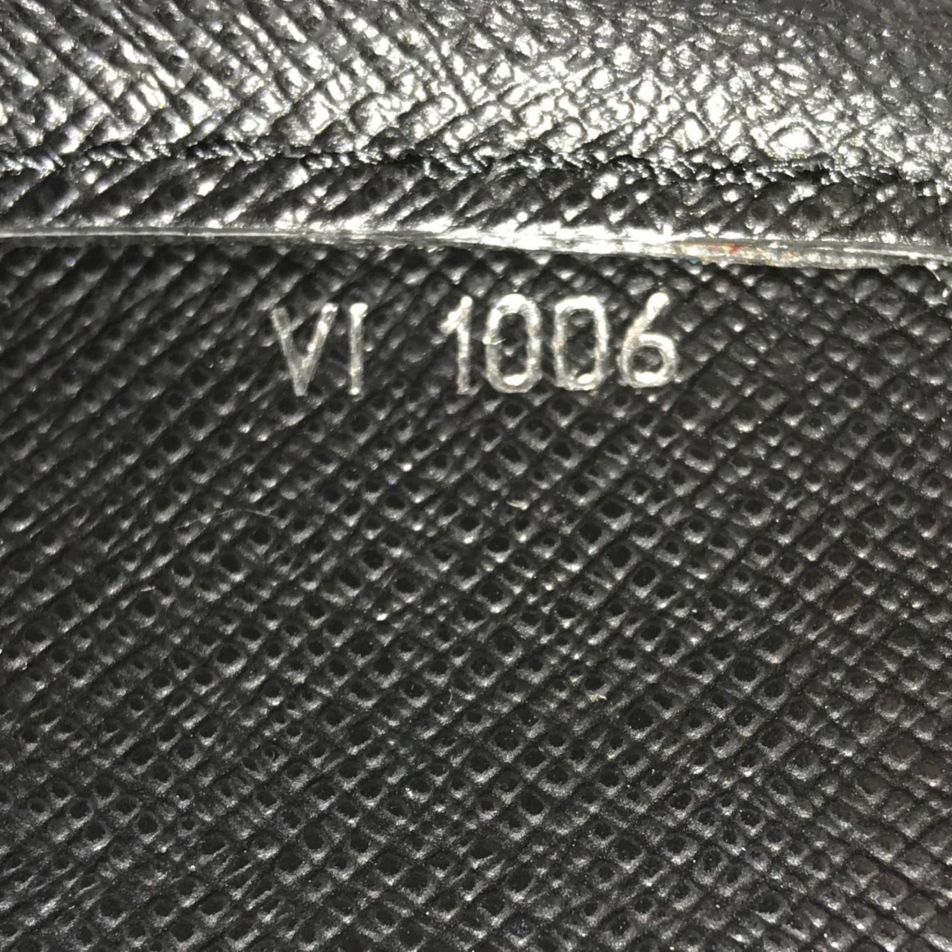 Louis Vuitton Pochette Baikal Clutch Taiga Leather  1