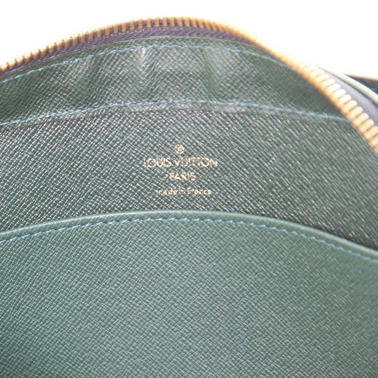 Louis Vuitton Pochette Baikal Clutch Taiga Leather