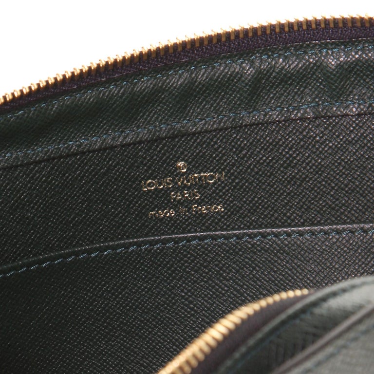 Sell Louis Vuitton Taiga Baikal Clutch - Dark Brown