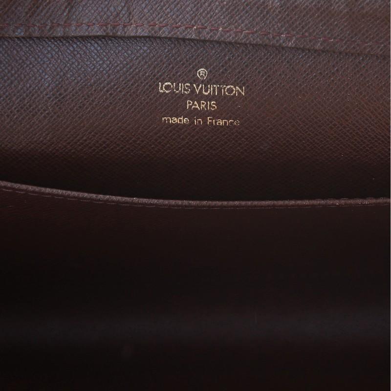 Women's or Men's Louis Vuitton Pochette Baikal Clutch Taiga Leather