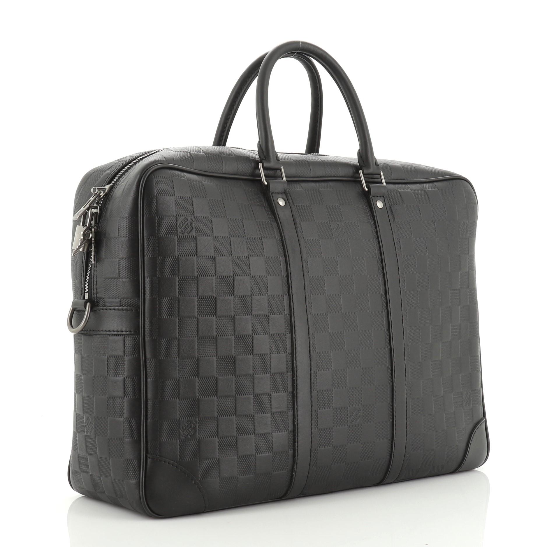 This Louis Vuitton Pochette Cosmos Limited Edition Titanium Monogram Canvas, crafted from gray monogram coated canvas, features front zip pocket and gold-tone hardware. Its zip closure opens to a gray fabric interior. Authenticity code reads: