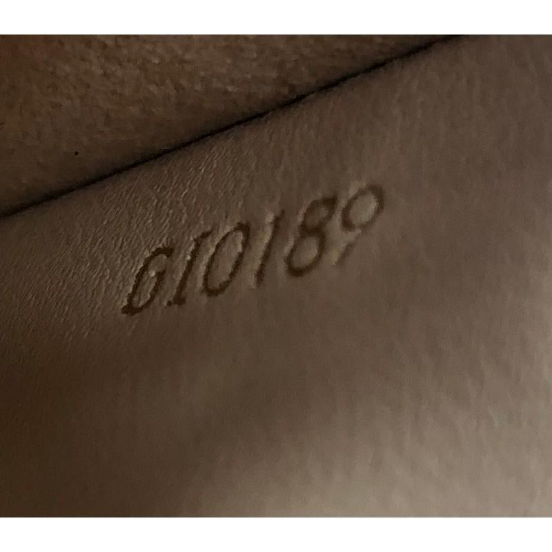 Louis Vuitton Pochette Double Zip Monogram Empreinte Leather In Good Condition In NY, NY