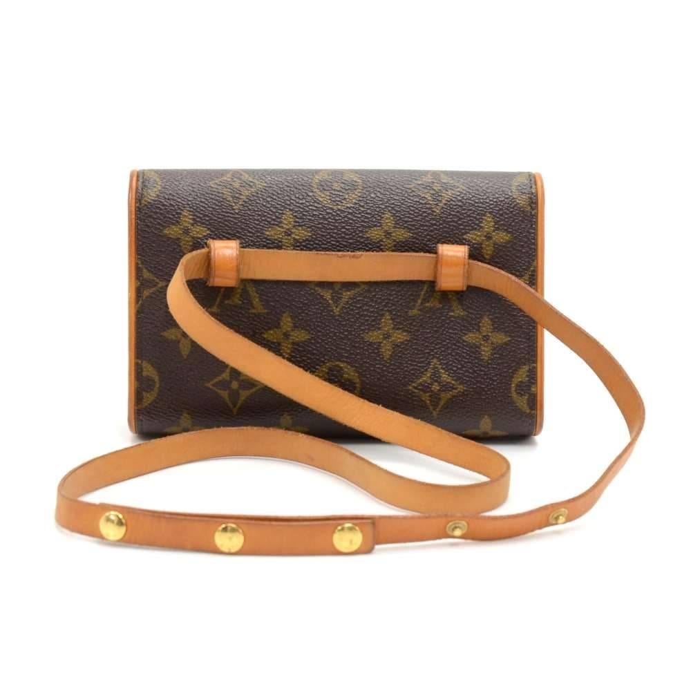 Authentic Louis Vuitton Florentine Pochette in monogram canvas. With its magnetic closure flap, the Florentine pouch is as practical as it is elegant. It can also be worn around the waist on the natural cowhide leather snap fastener belt. It comes