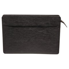 Louis Vuitton Pochette Homme Clutch Bag is crafted in black Epi leather