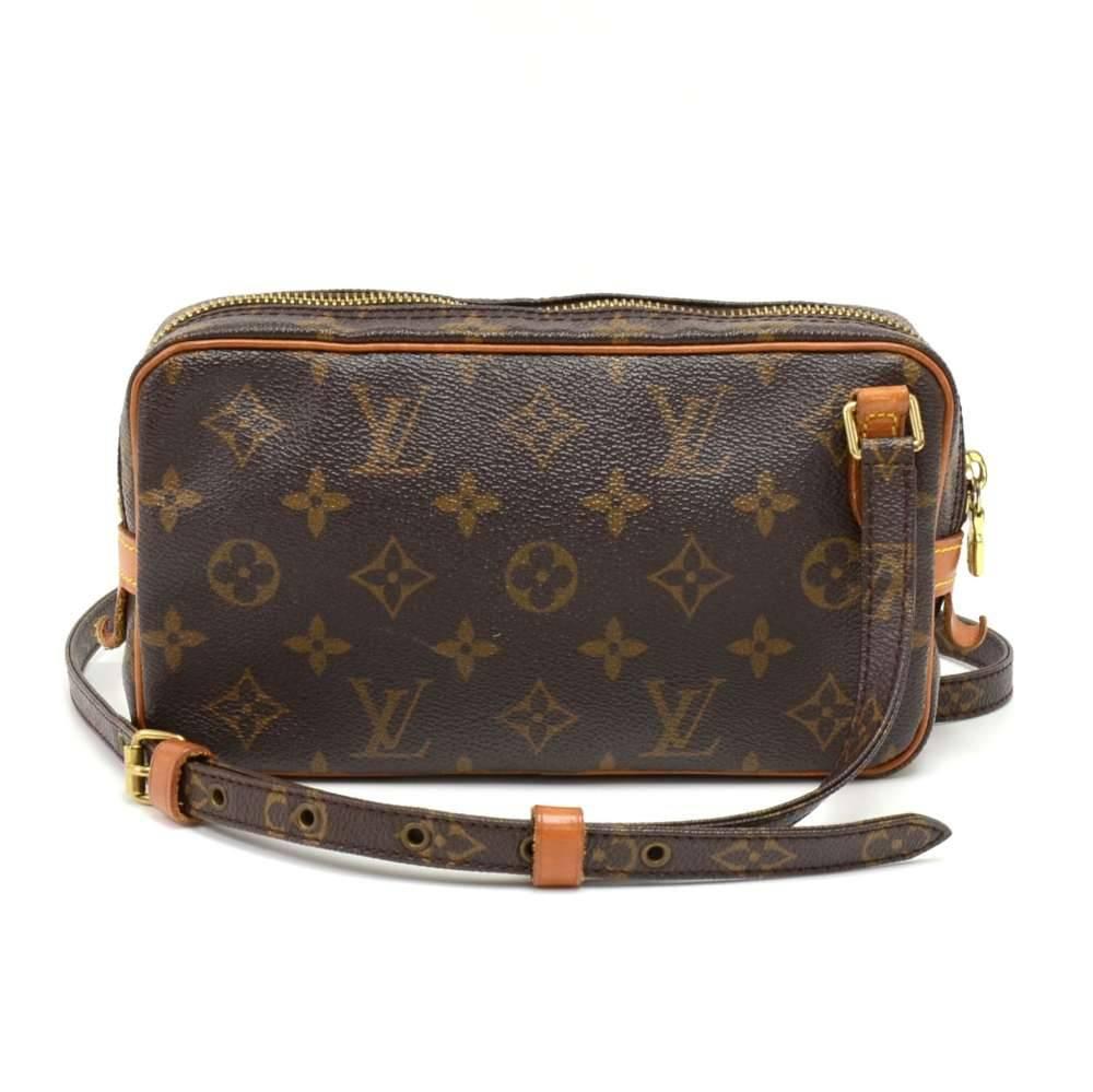 Louis Vuitton Pochette Marly Bandouliere in monogram canvas. It can be carried on the shoulder or across the body with an adjustable leather strap. It stores your small items and other daily essentials.  SKU: LP186

Made in: France
Serial Number: