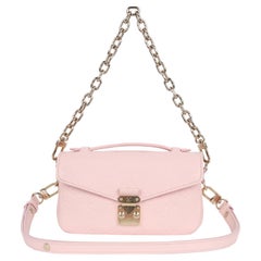 Louis Vuitton Pochette Métis East West in pelle rosa
