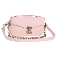 Louis Vuitton Pochette Métis East West Leather Pink