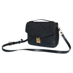 Louis Vuitton, Pochette Metis Empreinte in black