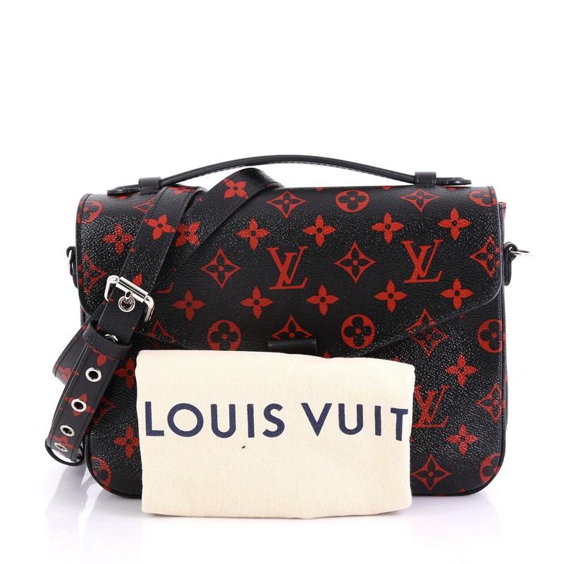This Louis Vuitton Pochette Metis Limited Edition Monogram Infrarouge, crafted from black monogram infrarouge coated canvas, features a leather top handle, frontal flap, exterior back zip pocket, and silver-tone hardware. Its S-lock closure opens to