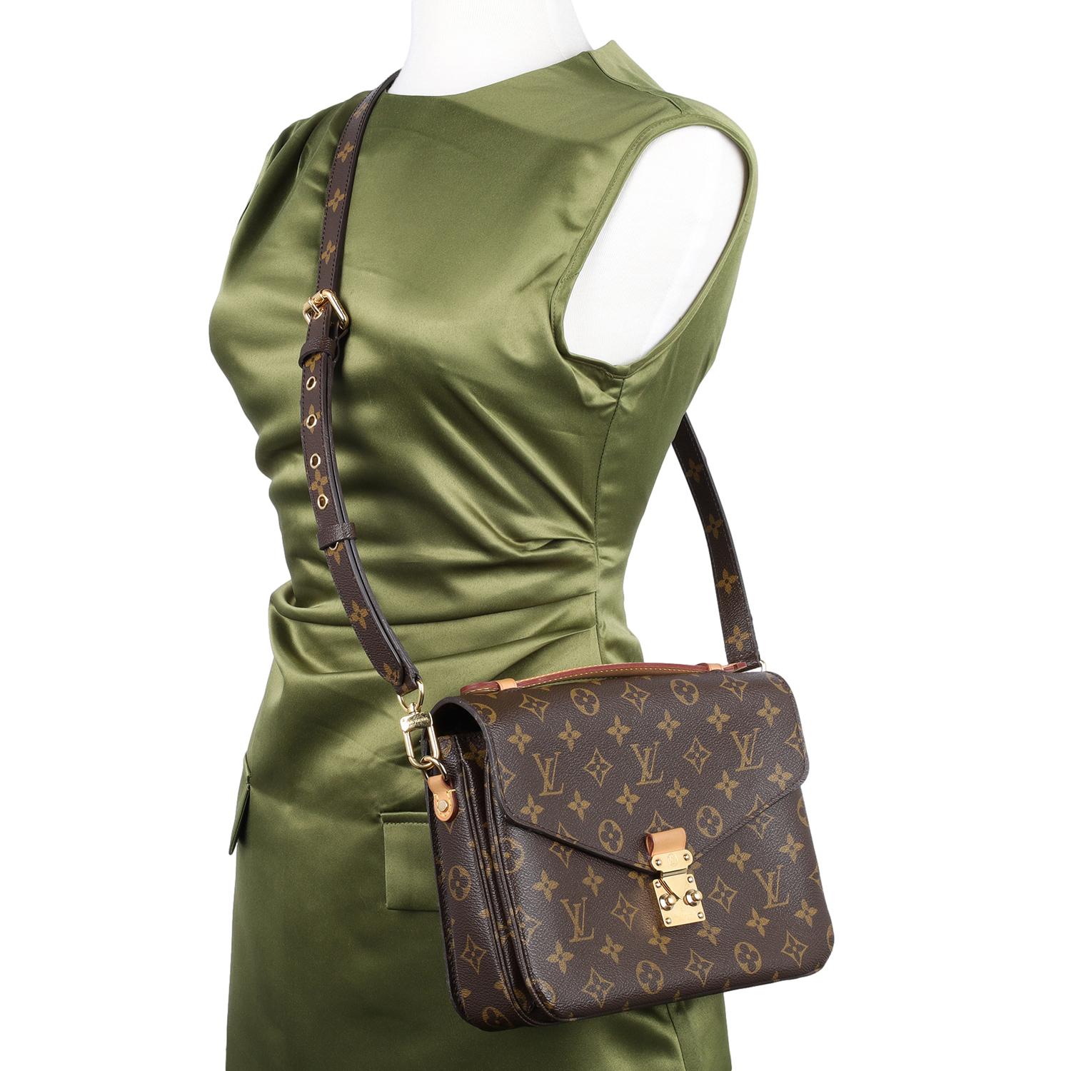 Authentic, pre-owned Louis Vuitton Pochette Metis in Brown Monogram. Features Brown Monogram Canvas with leather trim, top handle, adjustable and removeable leather strap, front gold S lock closure, textile interior with 3 inside compartments,