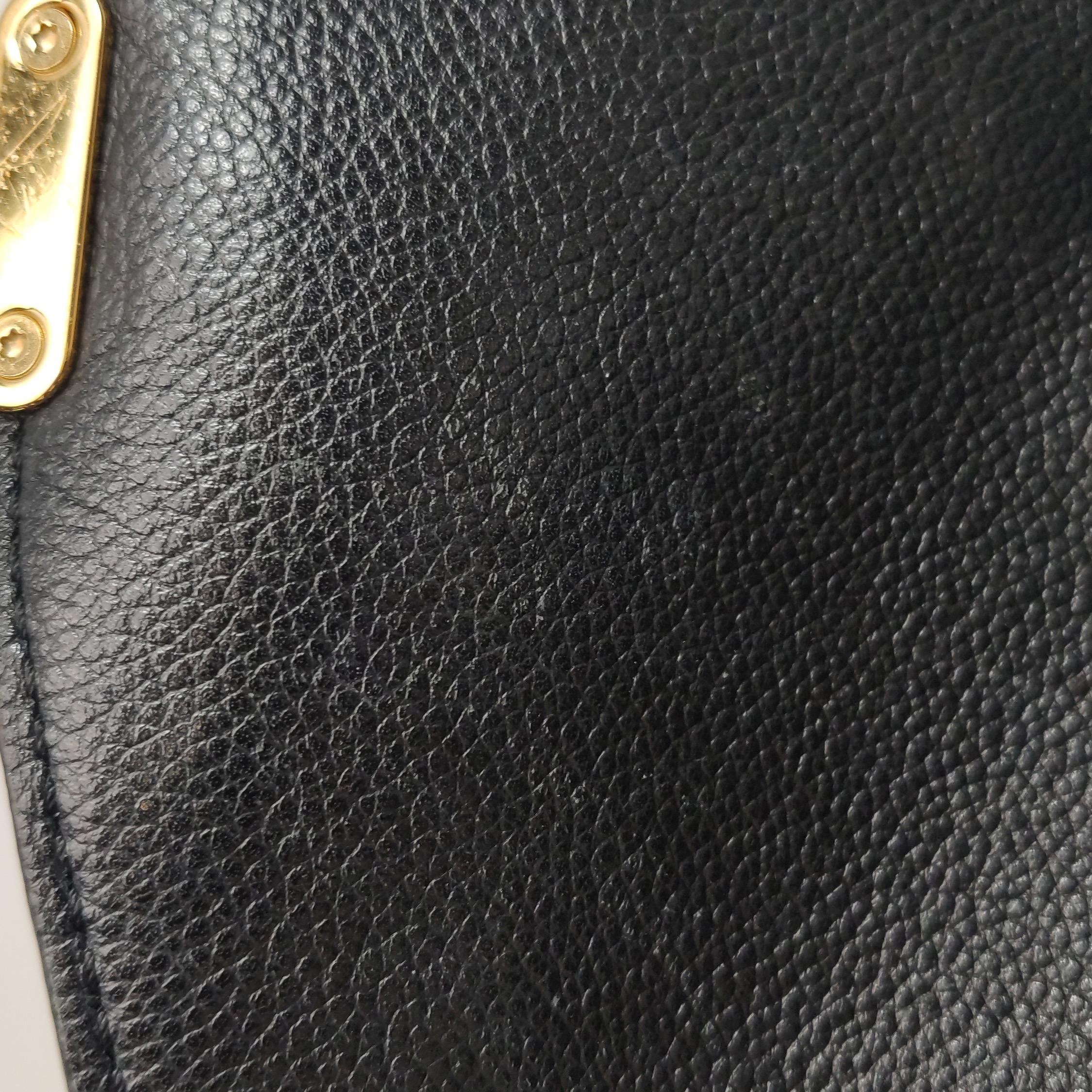 Louis Vuitton Pochette Métis Monogram Empreinte Leather Black For Sale 7