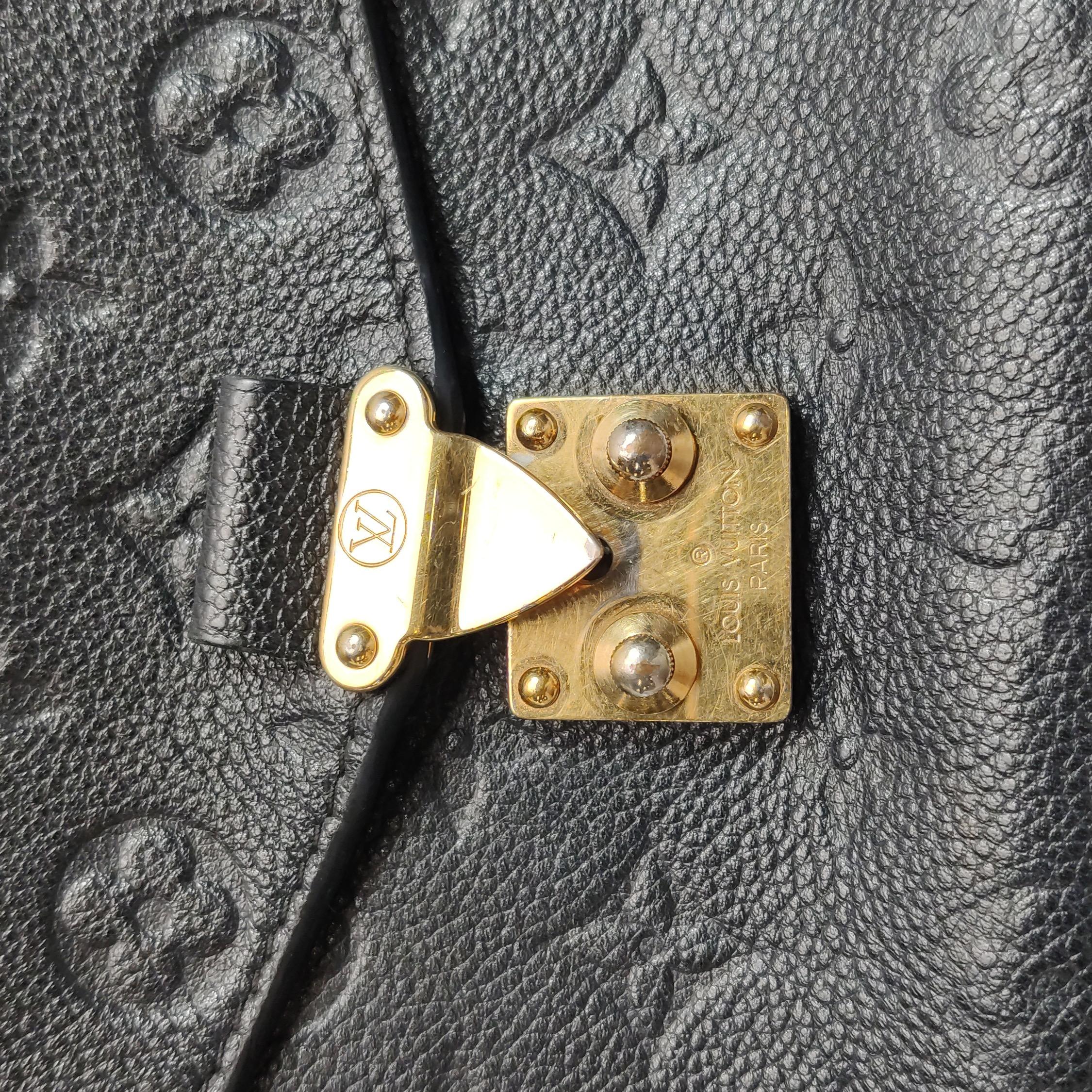 Louis Vuitton Pochette Métis Monogram Empreinte Leather Black For Sale 10