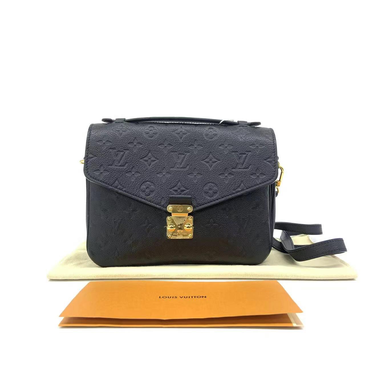 Louis Vuitton Pochette Mètis Monogram Empreinte Leather Black
  These are professional photos of the actual bag.
  
  Made from supple Monogram Empreinte leather and featuring an S-lock closure, the Louis Vuitton Pochette M√©tis is a sought-after