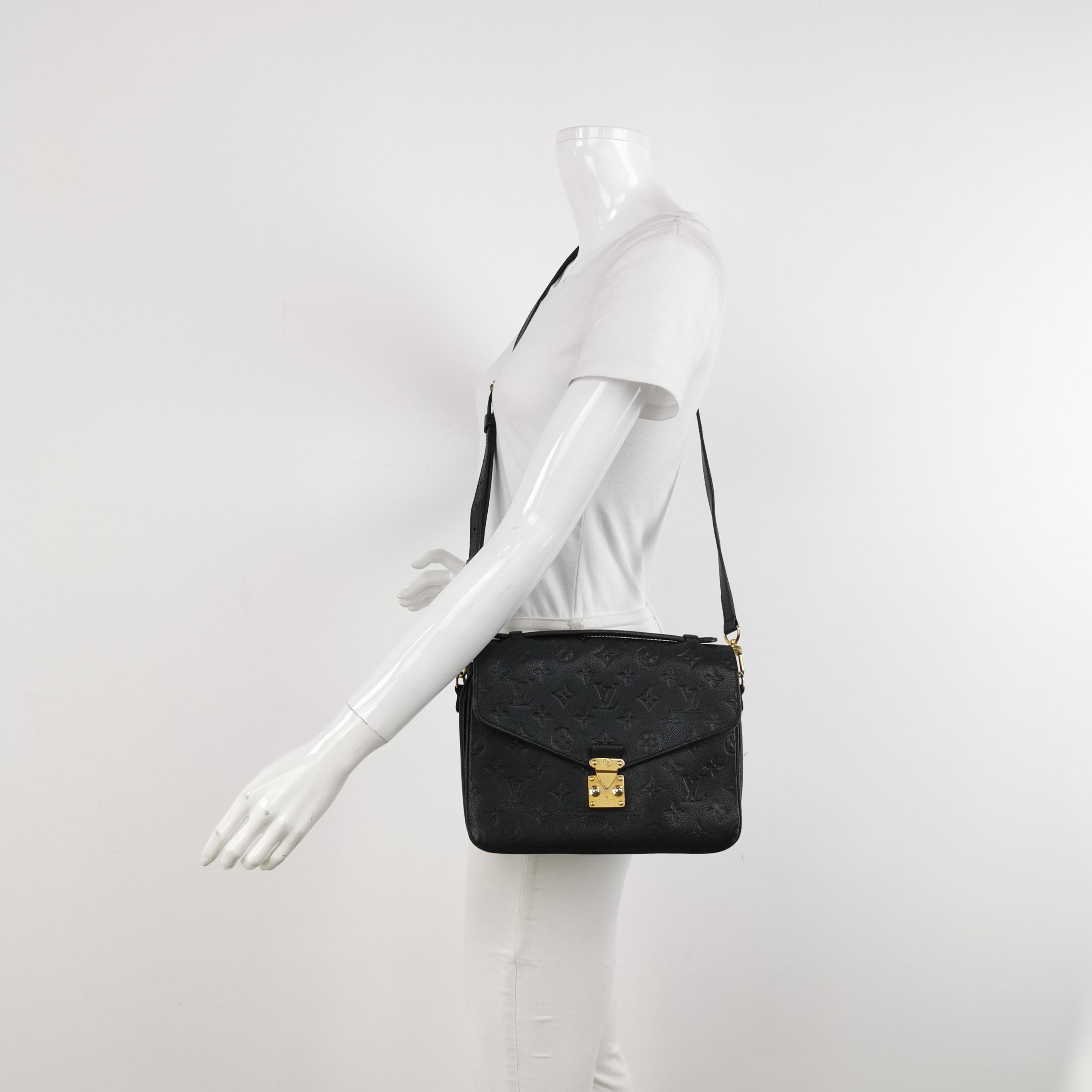 Made from supple Monogram Empreinte leather and featuring an S-lock closure, the Louis Vuitton Pochette Métis is a sought-after bag known for its versatility and spaciousness despite its compact size. Its elegant design is a modern take on the