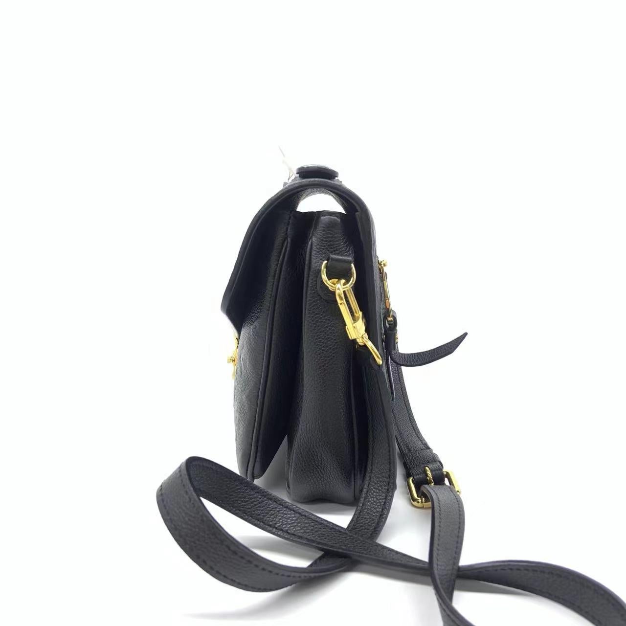 Louis Vuitton Pochette Mètis Monogram Empreinte Leather Black In Good Condition In AUBERVILLIERS, FR