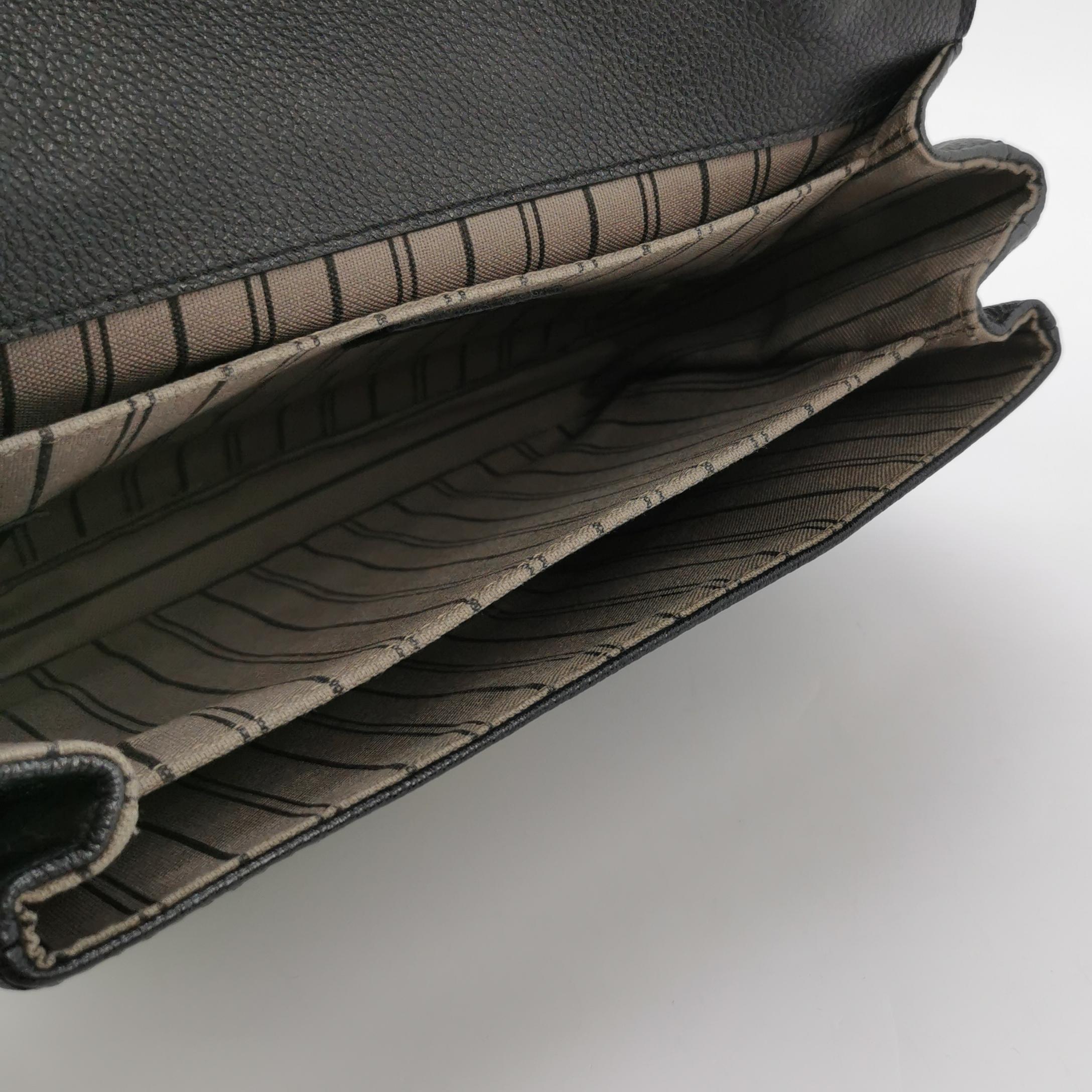 Louis Vuitton Pochette Métis Monogram Empreinte Leather Black For Sale 3